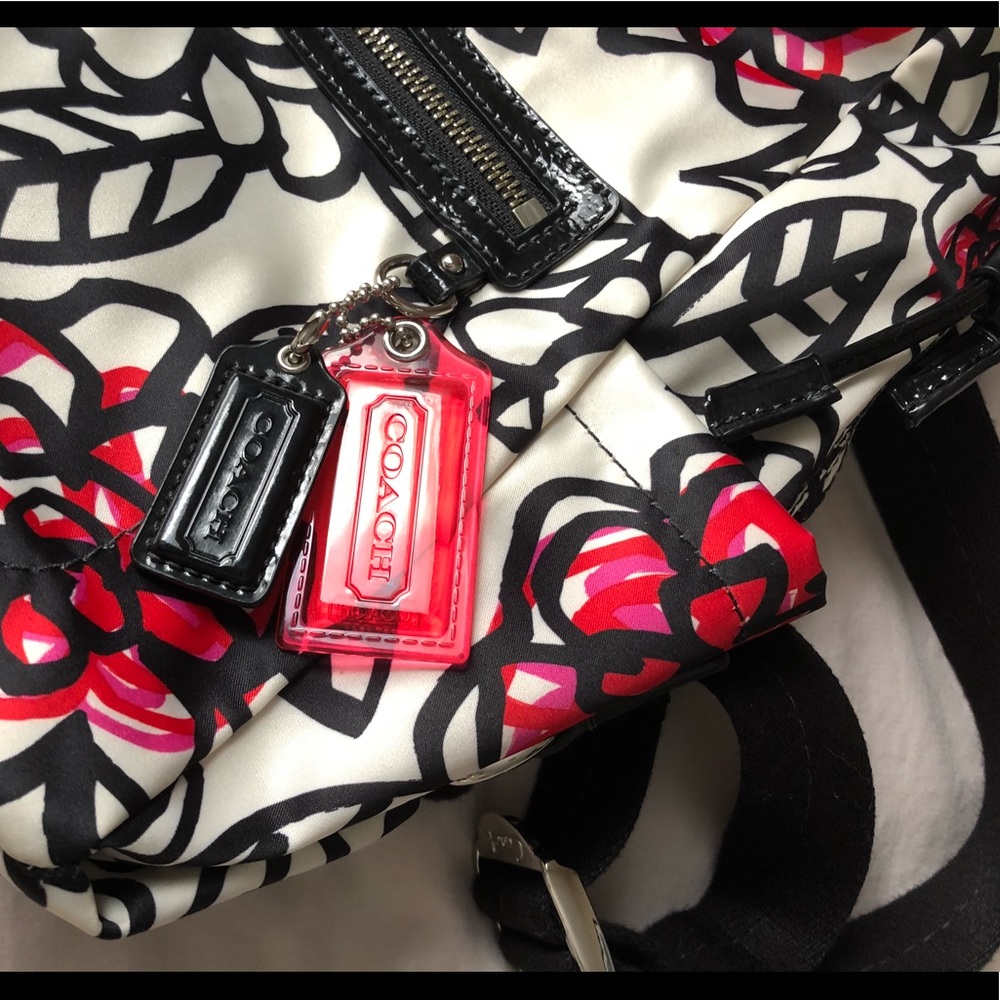 Coach backpack with floral graphic nylon fabic